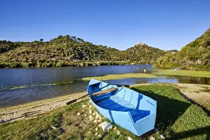 The Tagus river at Alamal beach. The 13th century castle of Belver dominates the entire