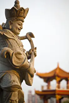 Taiwan, Kaohsiung, Lotus pond, Statues on bridge leading to Giant 72 meter high statue