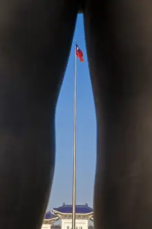 Taipei Prints: Taiwan, Taipei, Looking through legs of Li Chen Sculpture at Greatness of Sprit Premier