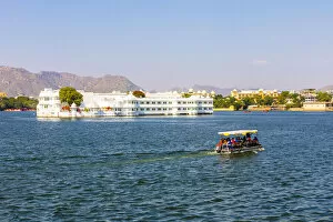 Images Dated 27th July 2020: Taj Lake Palace on Lake Pichola in Udaipur, Rajasthan, India, Asia