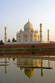 Marble Collection: Taj Mahal at sunset with Yamuna River in foreground, Agra, India