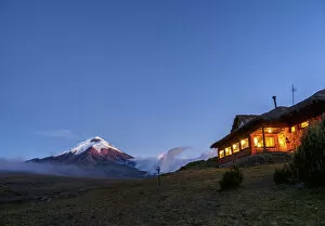 Images Dated 9th October 2018: Tambopaxi Mountain Shelter and Cotopaxi Volcano at twilight, Cotopaxi National Park