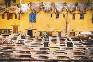 African Culture Collection: Tanned animal skins hanging to dry in the old tannery of Fez, Morocco