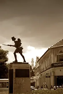 Sepia Prints: Tanzania, Dar es Salaam. The Askari Monument stands in the middle of a busy roundabout