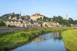 Tarnava Vare river with the old town of Sighisoara in the morning light Tarnava Vare river with the old town of Sighisoara in the morning light