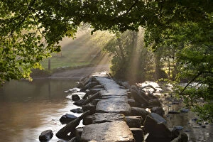Tarr Steps, an ancient clapper bridge spanning the River Barle, Exmoor National Park