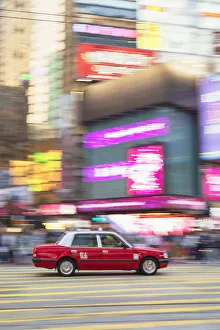 Images Dated 25th February 2020: Taxi passing along Hennessy Road, Causeway Bay, Hong Kong Island, Hong Kong