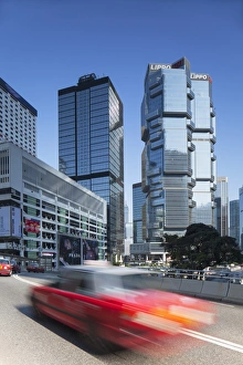 Business District Prints: Taxi passing along street, Admiralty, Hong Kong Island, Hong Kong