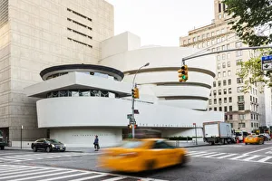 Images Dated 2nd February 2017: Taxis passing the Solomon R Guggenheim Museum, New York, USA