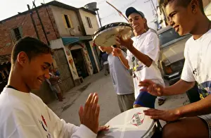 Boys Prints: Teenage boys drum and play the tambourine in their neighborhood in Sao Paulo