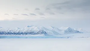 tempelfjorden depicted after sunset at dusk in late winter, Spitsbergen, Svalbard, Norway