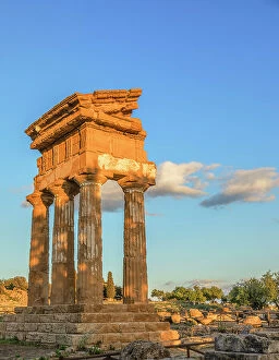 Images Dated 1st August 2023: Temple of Castor and Pollux at sunset, Valley of Temples, Agrigento, Sicily, Italy