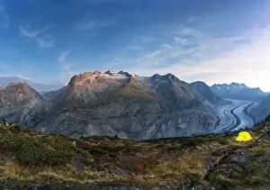 Lookout Prints: Tent of hikers on mountain ridge at the Hohfluh viewpoint above Aletsch Glacier