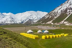 Kyrgyzstan Gallery: The tents of peak Lenin base camp with Lenin peak in the background