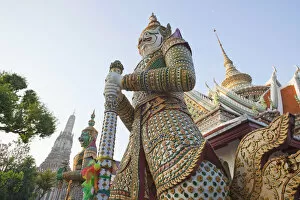 Thailand, Bangkok, Wat Arun, Statue at the Temple of Dawn