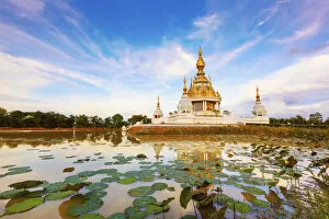 Images Dated 8th April 2021: Thailand, Isan, Khon Kaen, Wat thung setthi, temple surrounded by lily pads