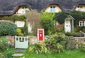 A thatched cottage in Lacock village, Wiltshire, England