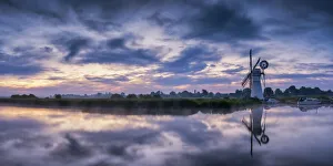 Thurne Mill & Clouds Reflecting in River Thurne, Norfolk Broads, Norfolk, England Thurne Mill & Clouds Reflecting in River Thurne, Norfolk Broads, Norfolk, England