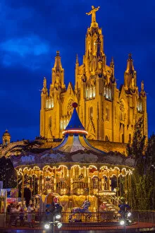 Images Dated 11th September 2014: Tibidabo amusement park by night with Temple de Sagrat Cor behind, Barcelona, Catalonia