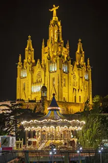 Merry Go Round Prints: Tibidabo amusement park by night with Temple de Sagrat Cor behind, Barcelona, Catalonia