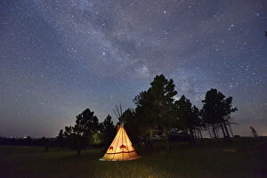 Tipi camp at night, Lakota Sioux Tipis, Custer County, Black Hills, Western South Dakota
