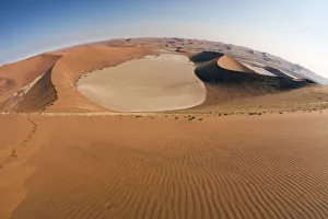 After a tiring ascent to the top of Dune 45, now comes the reward - running down