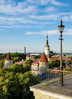 Baltic Collection: Toompea Hill Lookout Point, view over the Old Town towards St Olafs Church at sunset, Tallinn