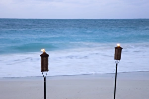 Torch Prints: Torches on beach, Grace Bay, Providenciales, Turks and Caicos