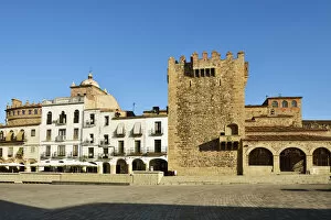 Extremadura Collection: Torre del Bujaco (Bujaco Tower), a moorish fortification, and the Plaza Mayor, a Unesco