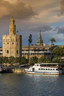 Images Dated 5th April 2016: Torre del Oro watchtower with Giralda bell tower in the background, Seville, Andalusia