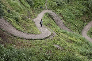 Images Dated 2nd February 2010: A tourist climbing the path to the Tango monastery near Thimpu, Bhutan