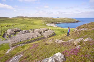 Isle Of Lewis Prints: Tourist at Gearrannan Blackhouse Village, Carloway, Isle of Lewis, western scotland