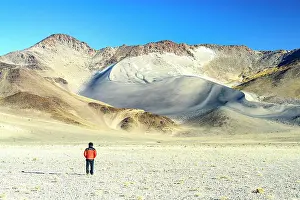Catamarca Prints: Tourist looking at the white pumice dunes, El Penon, Puna, Catamarca, Argentina. (MR)
