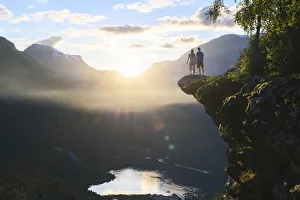 Two People Prints: Tourists admiring the Geirangerfjord, a UNESCO site. More og Romsdal, Norway