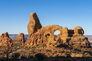 Natural Arch Prints: Tourists approaching Turret Arch against clear sky on sunny day, Arches National Park