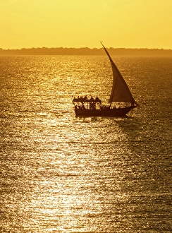 Dhow Prints: Tourists on a dhow sunset cruise, Nungwi, Zanzibar, Tanzania