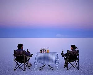 Salt Flat Collection: Tourists enjoy sundowners while looking out across