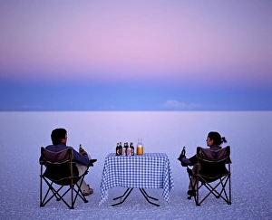 Salar De Uyuni Gallery: Tourists enjoy sundowners while looking out across