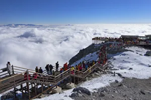 Tourists on Jade Dragon Snow Mountain (Yulong Xueshan), Lijiang, Yunnan, China Tourists on Jade Dragon Snow Mountain (Yulong Xueshan), Lijiang, Yunnan, China