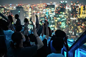 Deck Prints: Tourists photographing the view from Tokyo City View and Sky Deck of Roppongi Hills