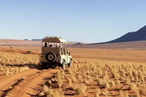 4 Wheel Drive Prints: Tourists on safari, Wolwedans, NamibRand Nature Reserve, Namibia, Africa