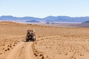 Jeep Prints: Tourists on safari, Wolwedans, NamibRand Nature Reserve, Namibia, Africa