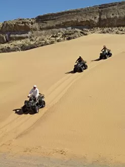Activity Gallery: Tourists set out on quad bikes to explore the magnificent