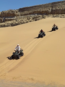Play Gallery: Tourists set out on quad bikes to explore the magnificent
