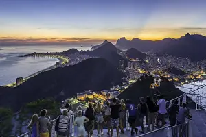 Cablecar Prints: Tourists viewing Christ the Redeemer on Mount Corcovado and the city at sunset