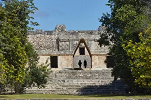 Archaeological Collection: Tourists visiting the ancient Mayan town of Uxmal, Yucatan, Mexico