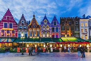 Tourists walking in Market Square in Bruges, Belgium