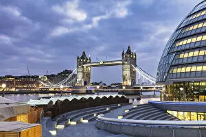 Images Dated 13th February 2019: Tower Bridge and City Hall, right, designed by Norman Foster illuminated at Christmas