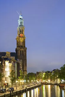 Tower of the Westerkerk church on the Prinsengracht canal at dusk, Amsterdam, North
