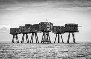 The towers of the Red Sands Fort - part of the decommissioned Maunsell Forts, the armed towers built in the Thames estuary to protect the Kent coast during the Second World War, near Whitstable, Kent, England